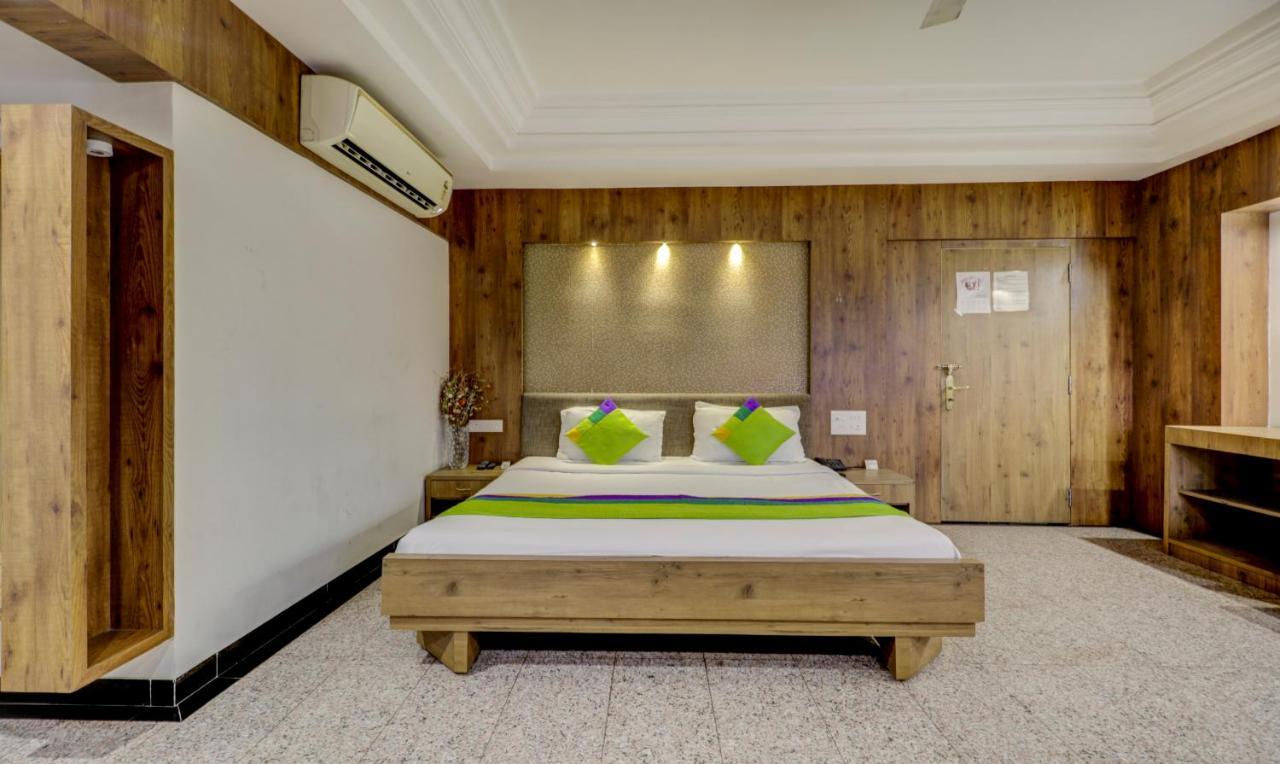 Treebo Orange City Hotel