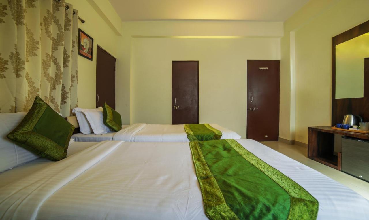 Treebo Ivory House Hotel